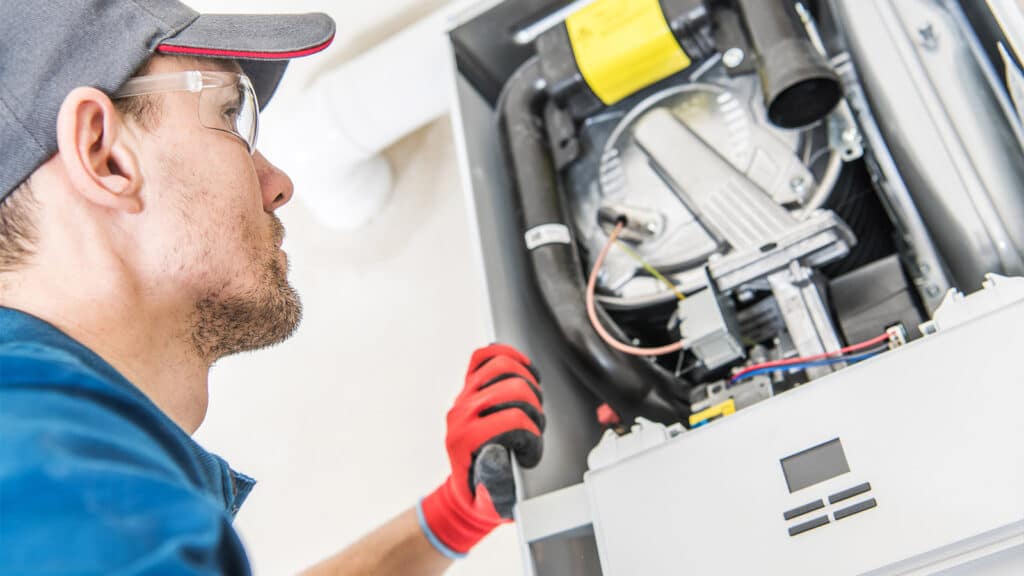 a man looking at a machine